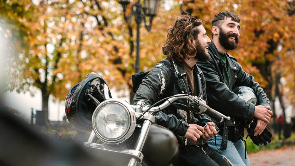 Two men with motorcycle / motorbike